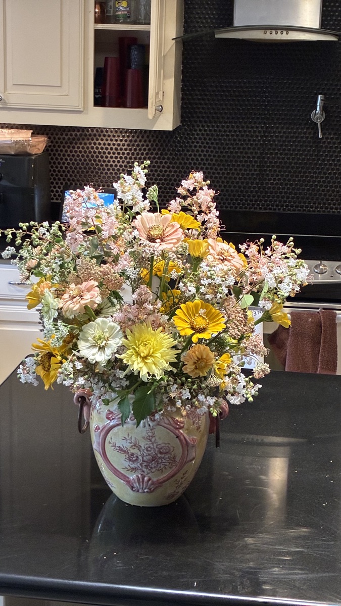 Soft peach and cream garden blooms